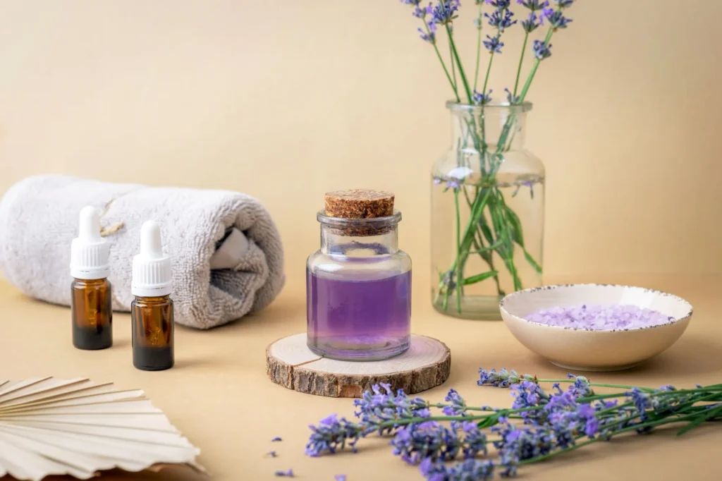 Current image: Aromatherapy essential oils beside standard massage oil at a Nordic spa